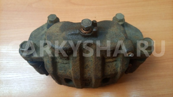 Суппорт тормозной передний левый Mitsubishi Mitsubishi i оригинальный номер MR370775