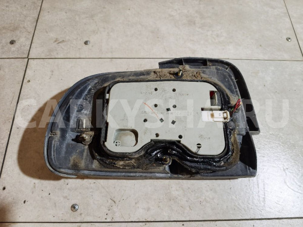 Фонарь задний правый Nissan Bluebird оригинальный номер B65504E200
