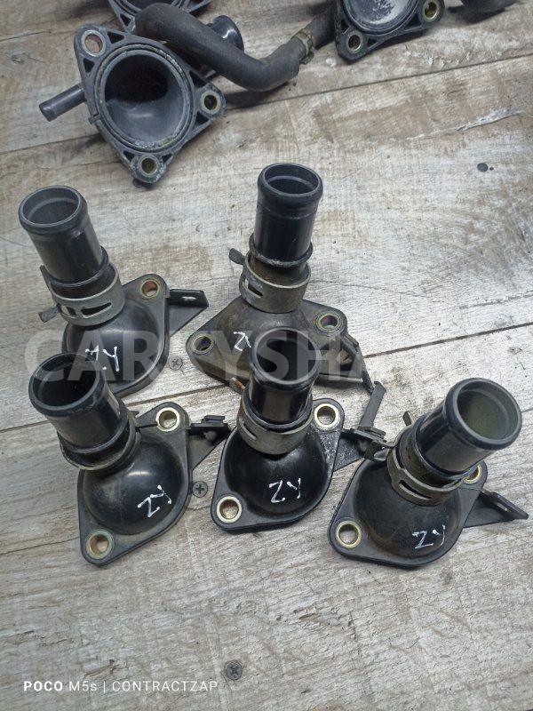 Крышка термостата Mazda 3 BK рестайлинг (2006—2009) Mazda 2 оригинальный номер ZJ0115172