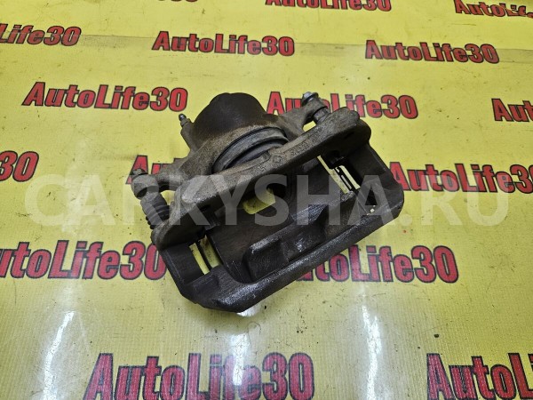 Суппорт тормозной передний левый Chevrolet Cruze 