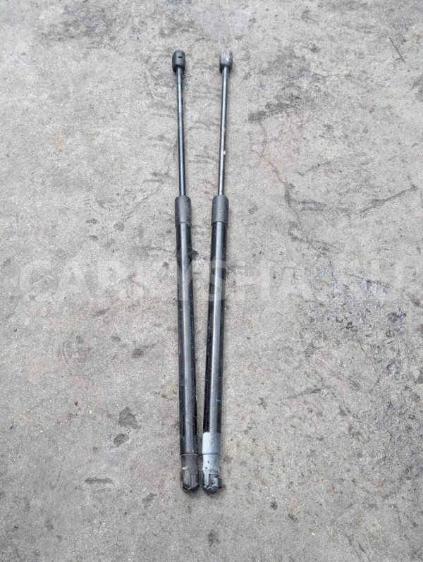 Амортизатор капота Volkswagen Touareg оригинальный номер 7L6823359B