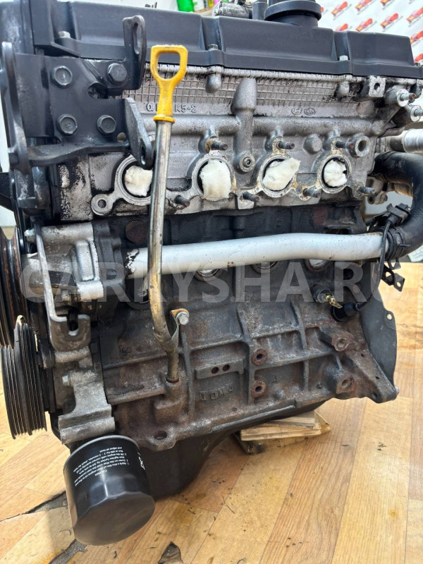 двигатель в сборе Kia Rio оригинальный номер KZ38302100