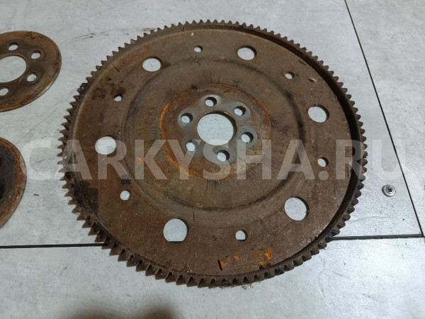 Маховик Toyota Yaris оригинальный номер 3210152021