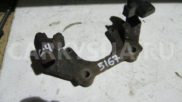 Скоба суппорта переднего Audi 100 (C4) 1991-1994 Audi 100 оригинальный номер 4A0615125