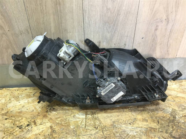 Фара левая Mazda CX 7 2007-2012 Mazda 2 оригинальный номер EH7151041