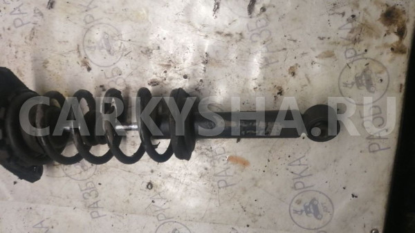Стойка амортизатора задняя Nissan Almera N16 Nissan Almera оригинальный номер 56210BM425