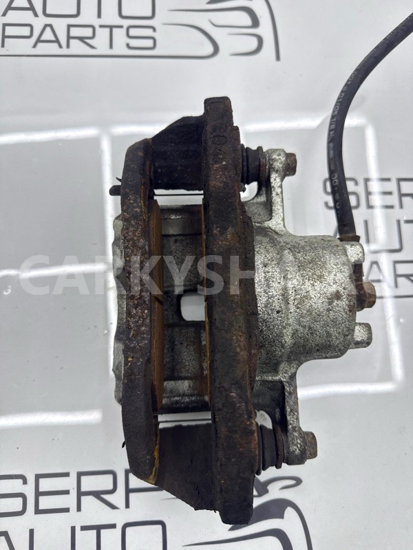 Суппорт передний левый Mitsubishi Lancer 9 CS3W Mitsubishi Lancer 