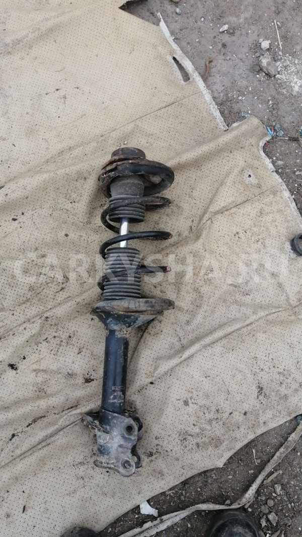 Стойка подвески  Nissan Sunny B15 Nissan Sunny 