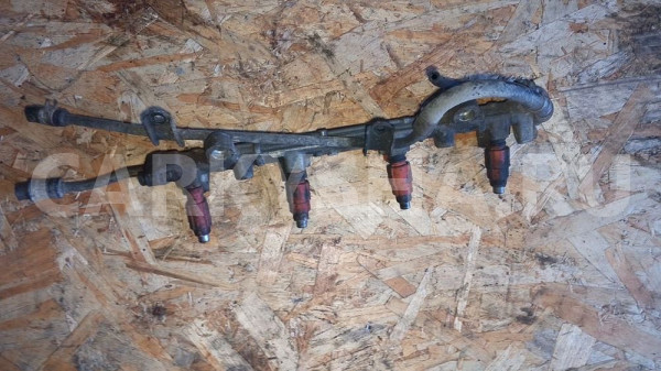 Рампа топливная с форсунками Mitsubishi Carisma Mitsubishi Carisma оригинальный номер MD315793