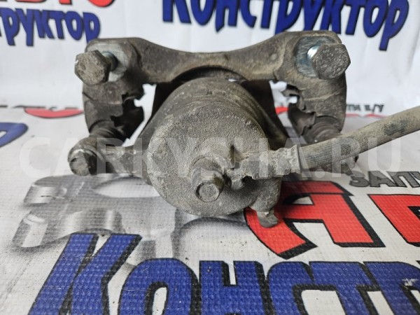 Суппорт тормозной Chevrolet Lacetti 