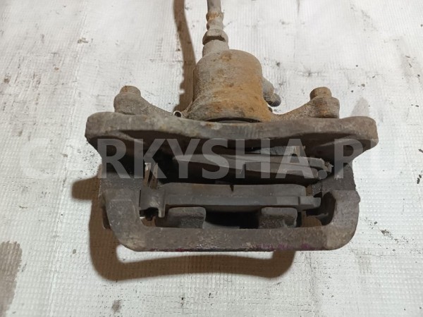 Суппорт тормозной задний правый Mitsubishi Diamante 