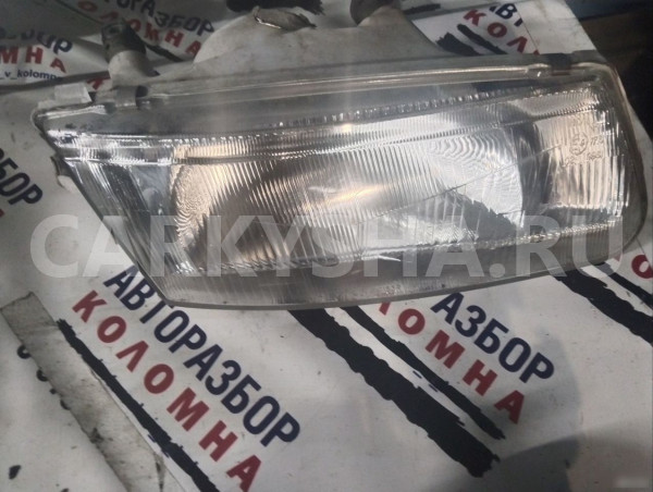 Фара левая Mitsubishi Carisma I (1995–2005) 082141 Mitsubishi Carisma оригинальный номер 082141153L