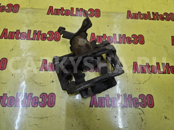 Суппорт тормозной задний левый Chevrolet Cruze 