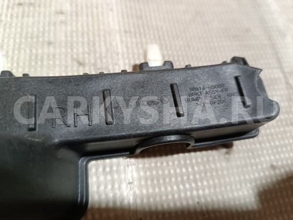 Кронштейн переднего бампера правый Hyundai Solaris оригинальный номер 86514H5000