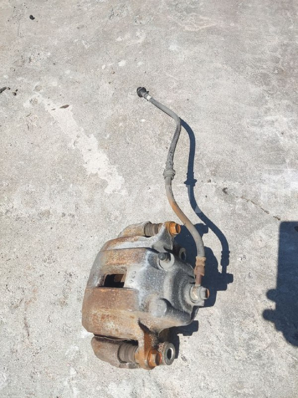 Суппорт Nissan Murano оригинальный номер 410011AA0A