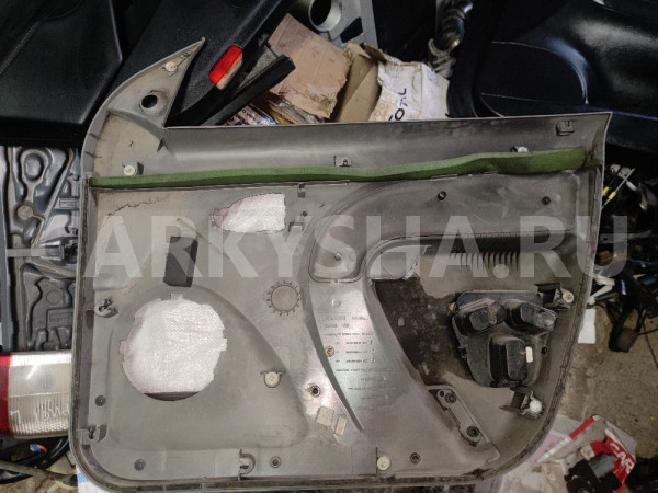 Обшивка двери передней левой Рено Логан Renault 15 оригинальный номер 8200295615