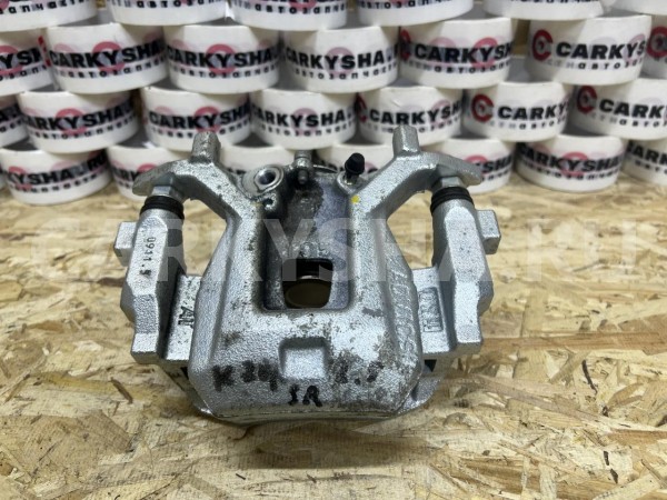 Суппорт задний левый Toyota Camry VIII (XV70) оригинальный номер 47850-33270