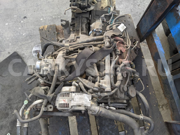 Двигатель Mitsubishi Minica оригинальный номер MD974822