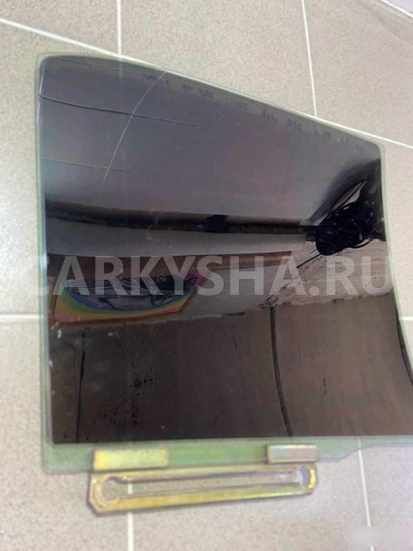 Стекло в дверь заднее левое Mazda Familia 2001 г Mazda 2 