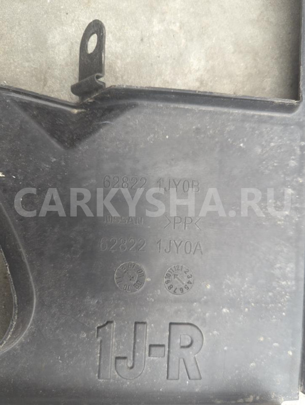 Защита радиатора Nissan Tiida оригинальный номер 628221JY0B