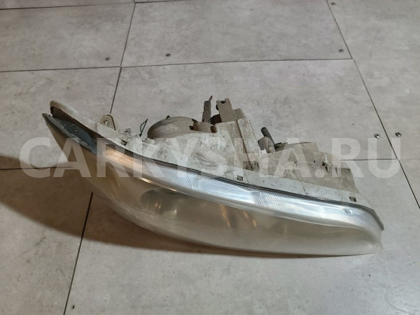 Фара правая Nissan Cefiro оригинальный номер 260102Y027