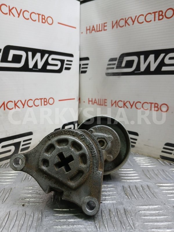 натяжитель Subaru Legacy 