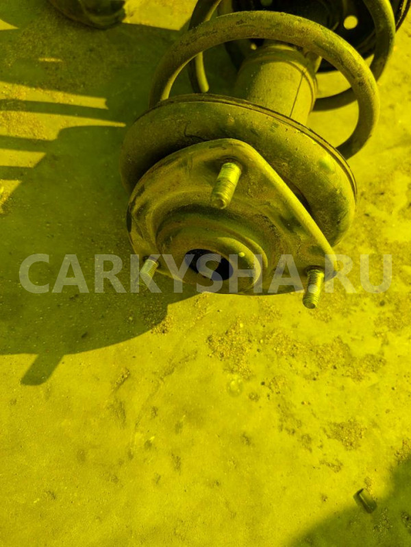 Стойка амортизатора Mitsubishi Colt 