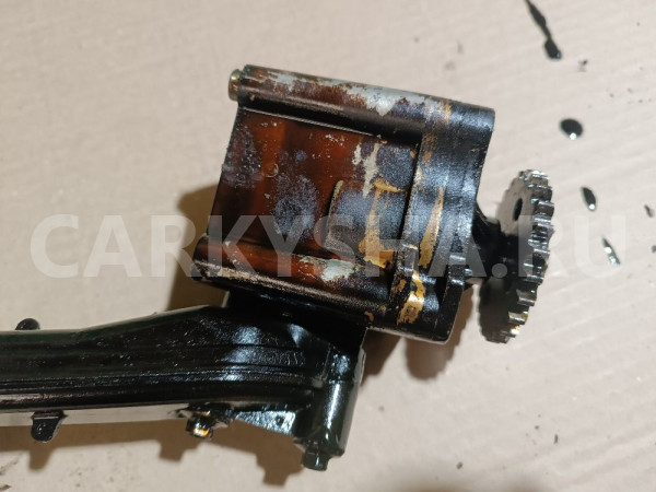 Насос масляный Mazda 2 оригинальный номер LF0214100A