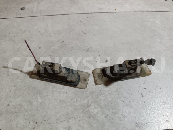 Фонарь подсветки номера Nissan Pulsar оригинальный номер 265103J100