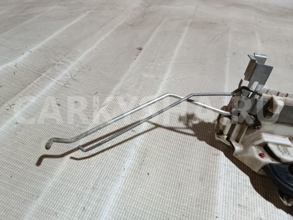 Замок двери передней левой Suzuki Liana 