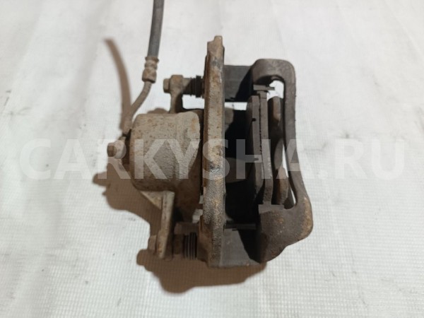 Суппорт тормозной передний правый Kia Rio 