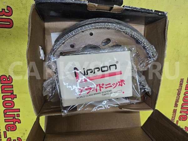 Колодки тормозные Mazda Demio оригинальный номер D10226310B