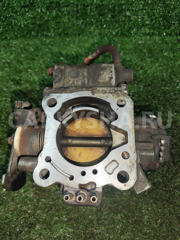 Дроссельная заслонка Mitsubishi Carisma Mitsubishi Carisma оригинальный номер MD183307