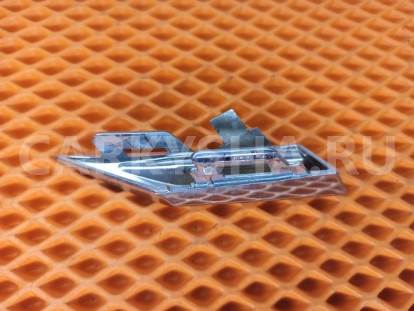 Молдинг решетки радиатора левый Volkswagen Touareg Volkswagen Touareg 