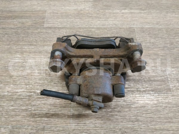 Суппорт тормозной передний правый Volkswagen Tiguan 