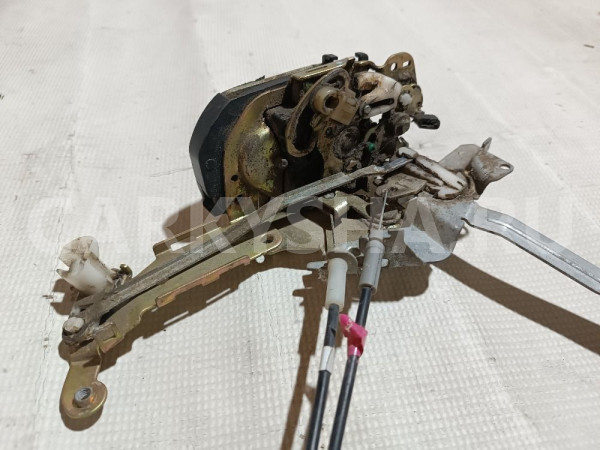 Замок двери передней левой Toyota Corolla оригинальный номер 6904012520