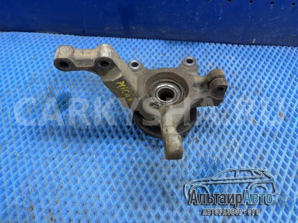 Кулак поворотный передний левый Nissan Micra Note Nissan Note оригинальный номер 40015AX600