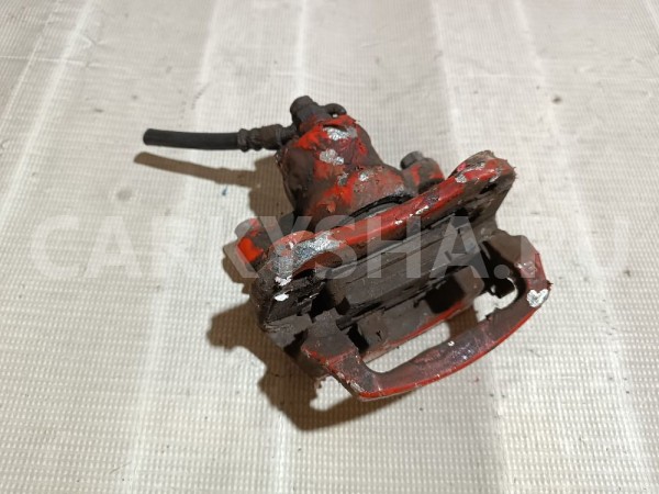 Суппорт тормозной задний левый Lexus RX 