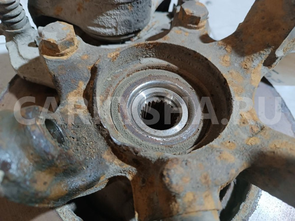 Кулак поворотный передний правый Nissan Sunny оригинальный номер 400145M000