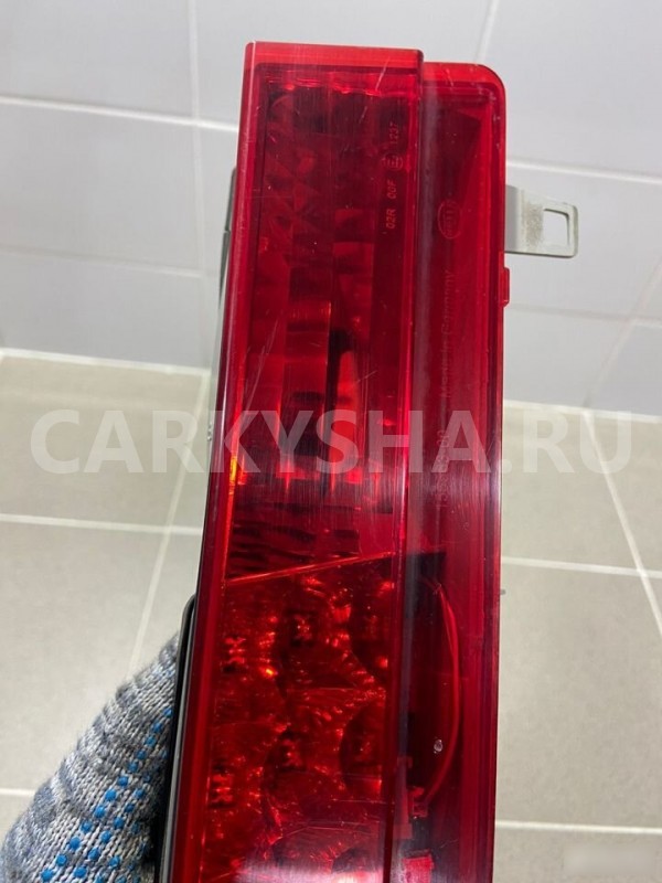 Фонарь багажника левый BMW 745I E65 2002 г BMW 7er оригинальный номер 63218379689