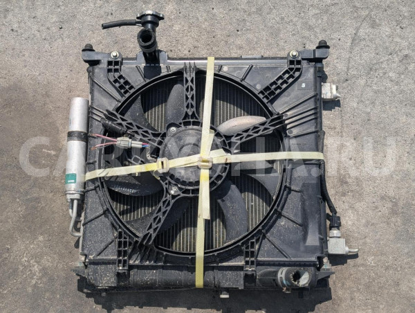 Диффузор радиатора Nissan Note оригинальный номер 214811HC0A