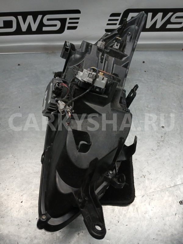 Фара Subaru Exiga 