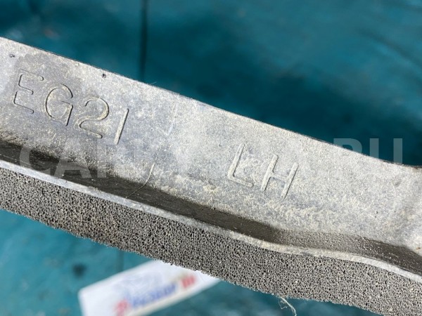 Пыльник переднего левого крыла Mazda CX-7 I Mazda 2 оригинальный номер EG2156396D