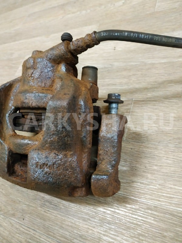 Суппорт тормозной передний левый Land Rover Freelander 