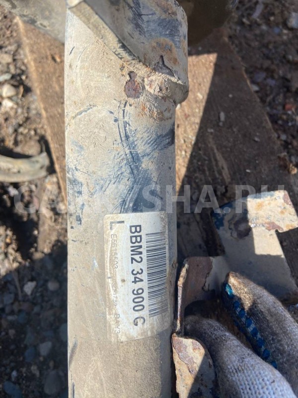 Амортизатор передний Mazda 3 BL рестайлинг (2011—2013) Mazda 2 оригинальный номер bbm234900c