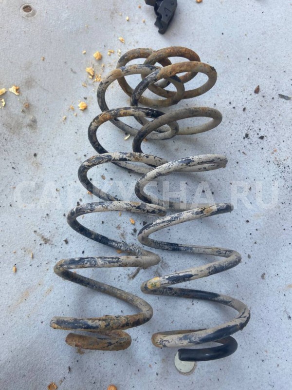 Пружина задняя Mazda Demio IDY (2002—2007) Mazda 2 оригинальный номер D35028011D