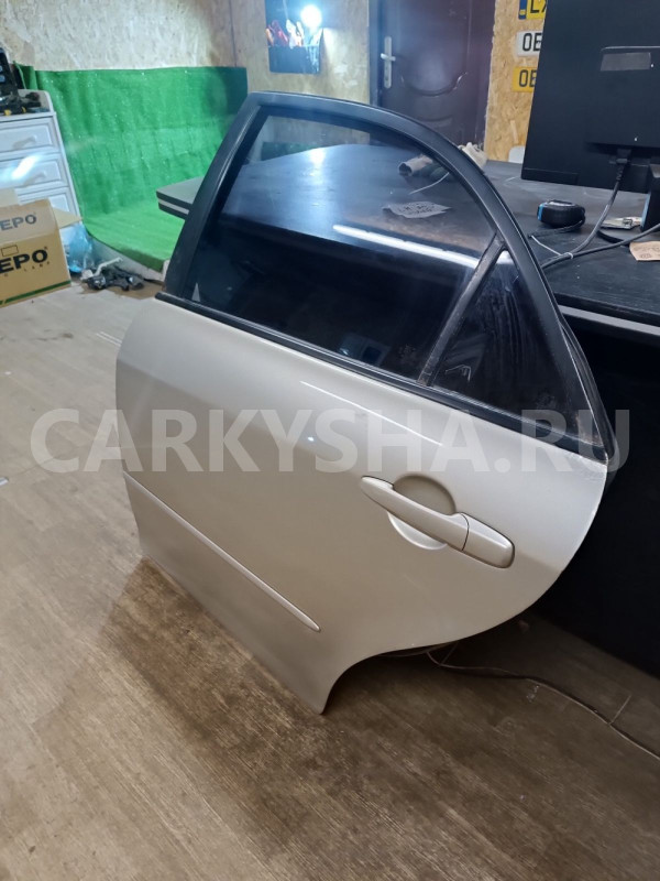 Дверь задняя левая Mazda 2 оригинальный номер GJYJ7302XC