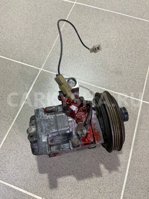 Компрессор кондиционера Mazda Demio DW Mazda 2 оригинальный номер H09A0AA4HU
