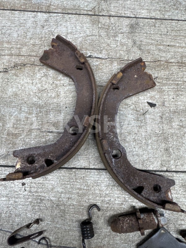 Механизм разведения колодок 2WD Action New левый Ssang Yong Actyon оригинальный номер Bd48103600