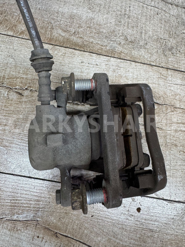 Суппорт задний левый LR Freelander 2 Land Rover Freelander оригинальный номер LR001026